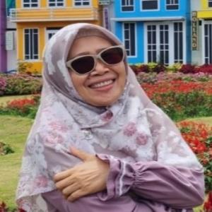 Dr. Hj. Hartini Haritani, M.Pd